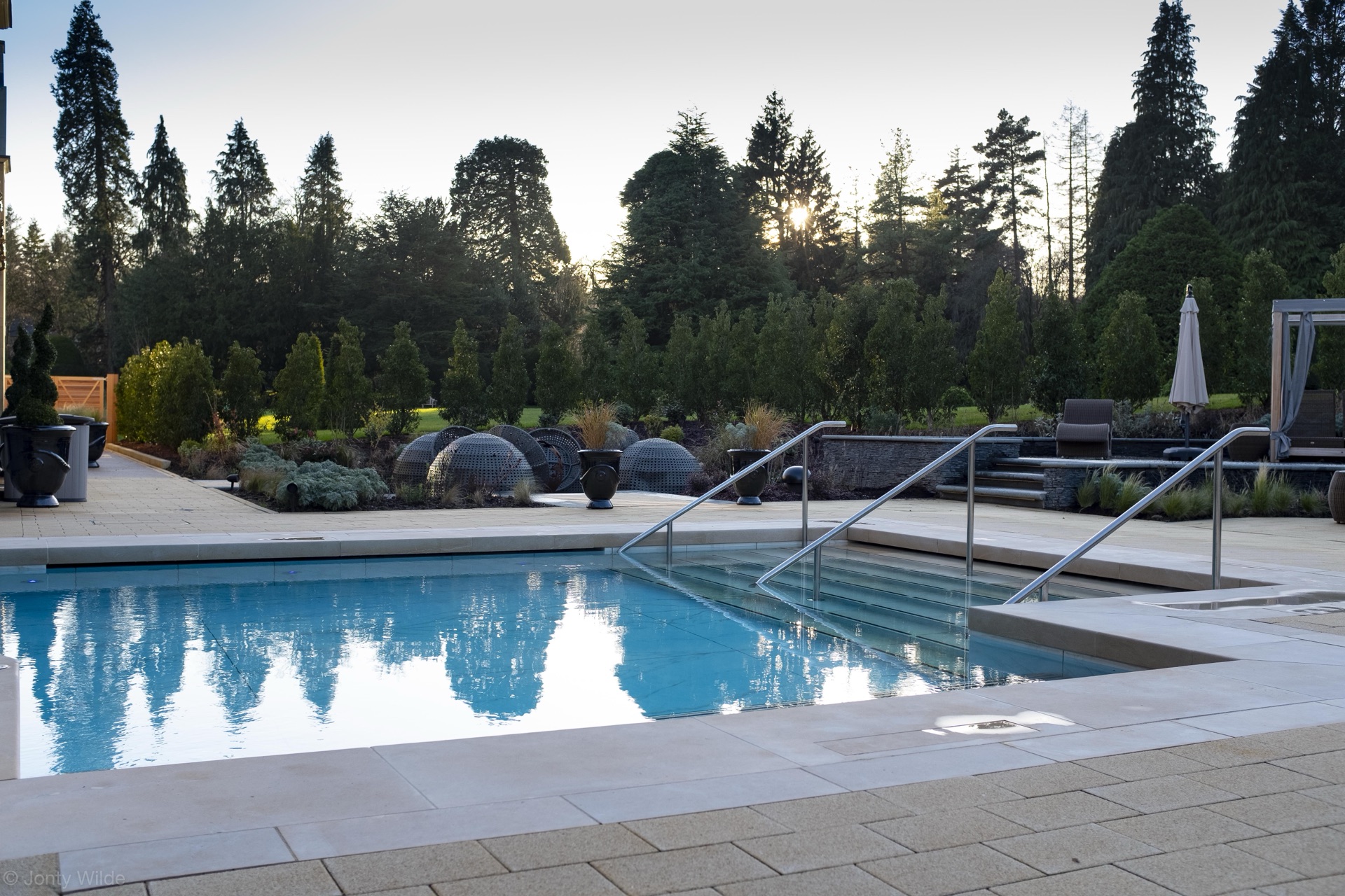 Landscaped rooftop terrace with outdoor dining