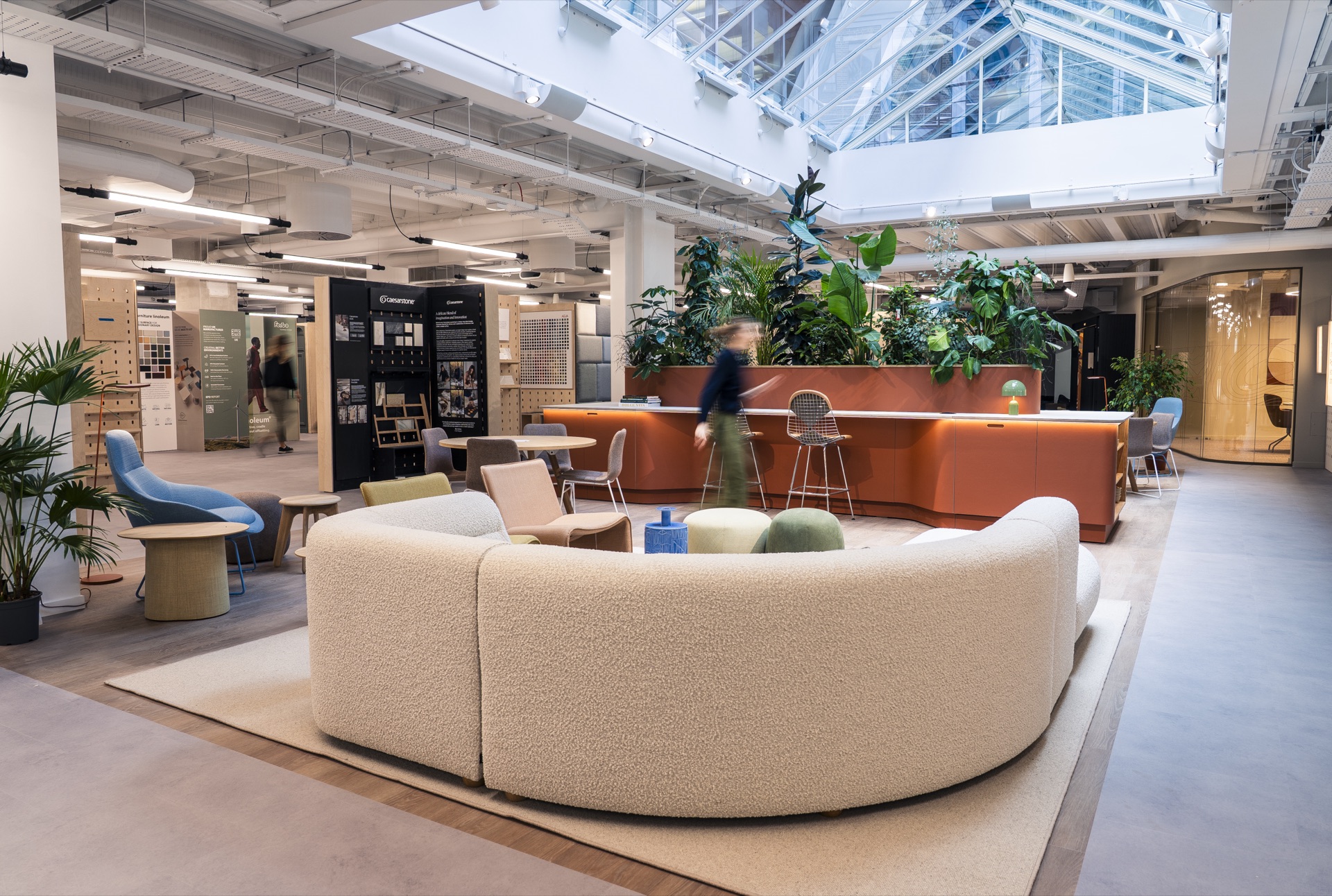 Habitech Pro London Experience Centre with open-plan showroom, curved seating and skylight